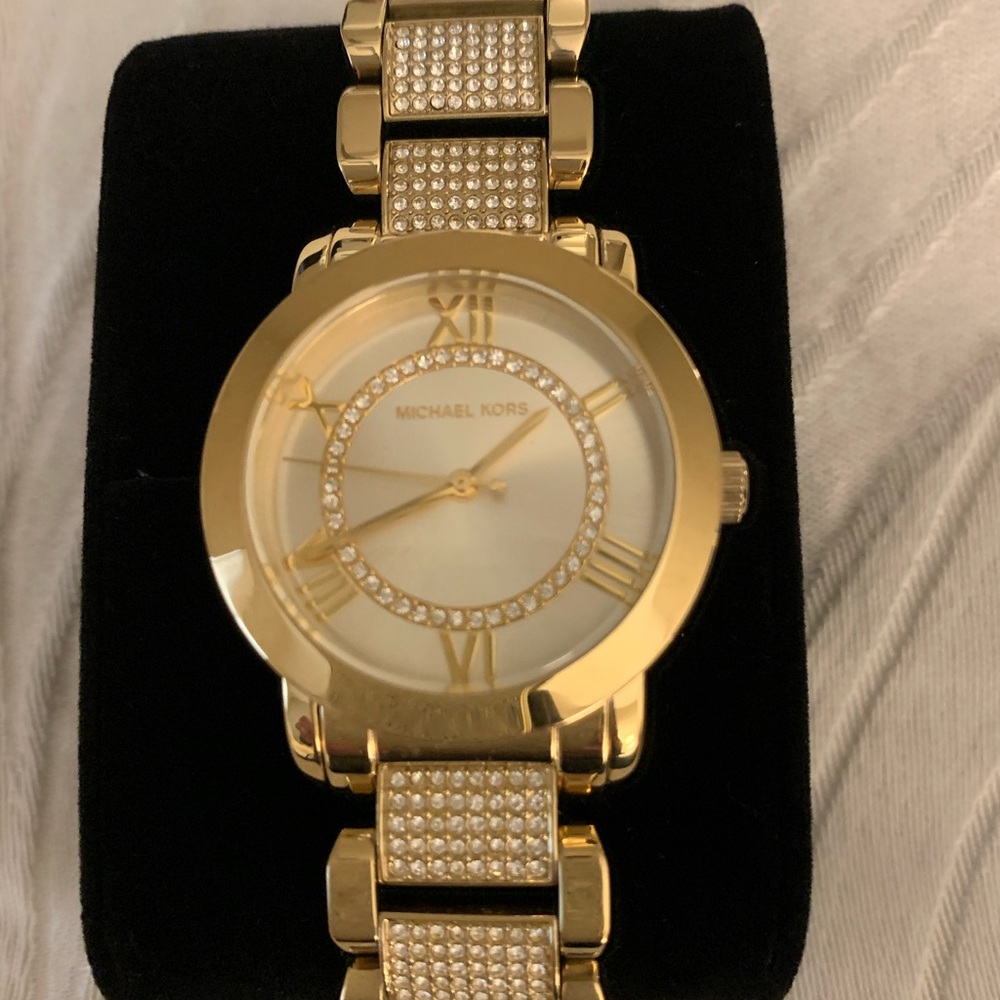 Michael Kors gold tone band with silver rhinestone